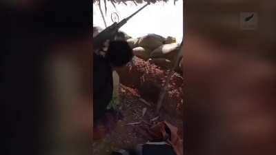 A .50 caliber machine gun jammed as PDF (anti-junta fighters) attempted to shoot down two Myanmar military junta paramortars near Factory No. 22 of the DDI in Seikphyu Township, Pakokku District, Magway Division. Febuary 2025