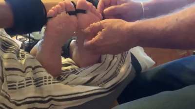 Slow tickles on very ticklish feet