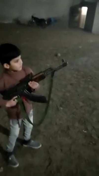 Kid shoots AK, the people who gave him the AK are idiots.