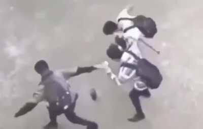 School kids dancing around a Bluetooth speaker, reminded me of that one video of a shirtless guy dancing alone in a festival