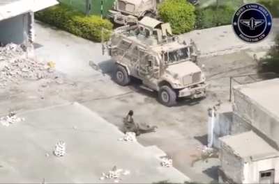 An officer from the Pakistani SF (SSG) is severely wounded while attempting to shield one of his men using his own body, from a TTP attacker