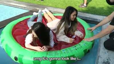 Valkyrae and Tina cuddling in a pool