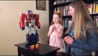 Little girl with her new toy