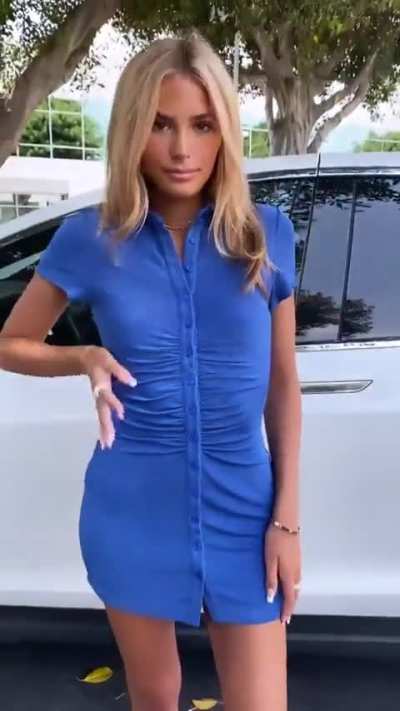 Blonde Isabelle tries on different color mini shirt-dresses