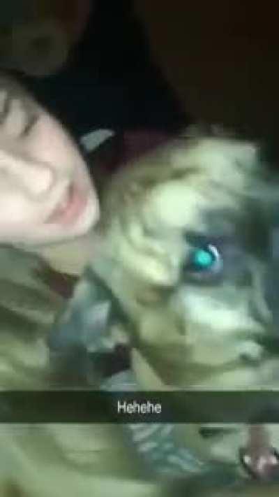 White girl licks dogs tongue..