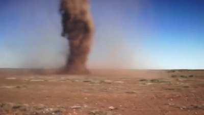 Guy runs into tornado for a selfie