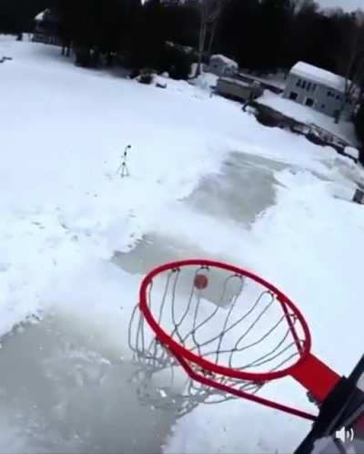 Guy dunking on his ice skates