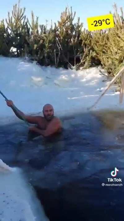 Swimming in ice cold water in a cold winter morning