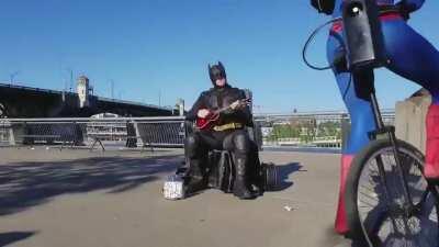 Batman gets ambushed by Spider-Man