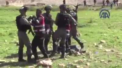 Israeli soldiers attacking Palestinian paramedics as they rescue the injured to save their lives!!!
