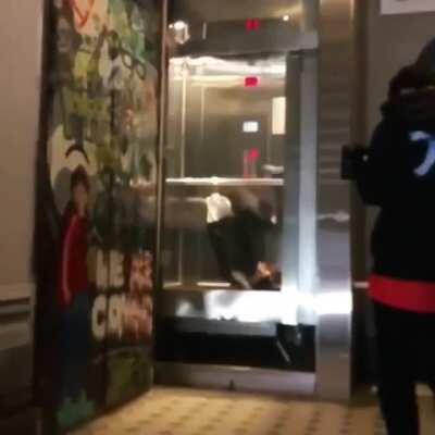 Don't be stupid doing a backflip in a moving elevator!