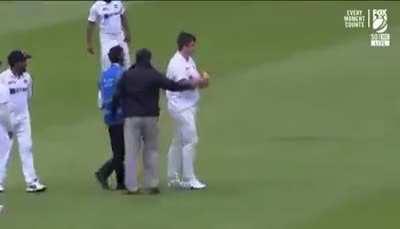 English fan trying to blend in with players wearing Indian jersey.