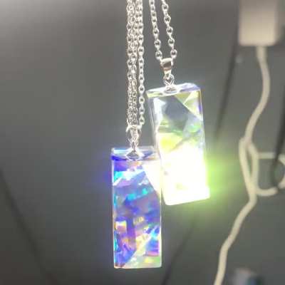 A few dichroic glass pendants I made recently that sparkle.