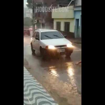 What could go wrong taking a shower in the middle of the road?