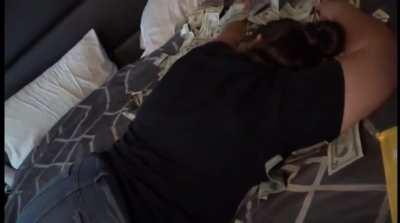 Rolling around in money