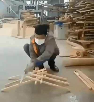 Making a DaVinci bridge out of a pile of wooden sticks