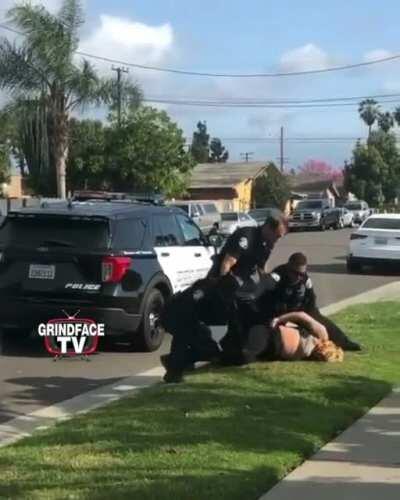 Cell phone video surfacing of an officer punching a handcuffed woman after being kicked yesterday in Westminster. #OrangeCounty #grindfacetv