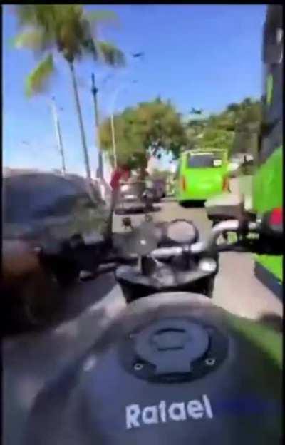 Biker Gets Instant Karma after lane splitting at high speed