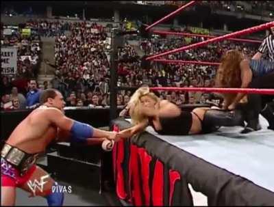 Trish getting her fat ass spanked while in her thong.