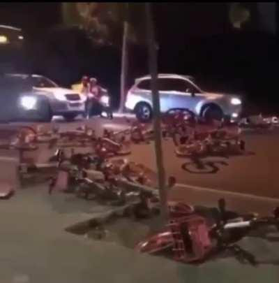 Bicyclists protest by blocking roads with bikes.