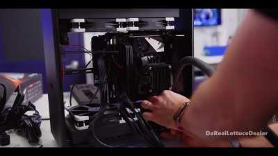 Had a day off so i recut Linus experience of building a watercooled mini ATX build into 1 minute.