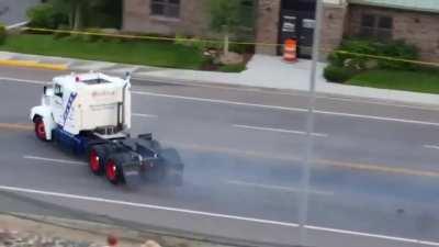 Launching a semi off a ramp in the middle of town