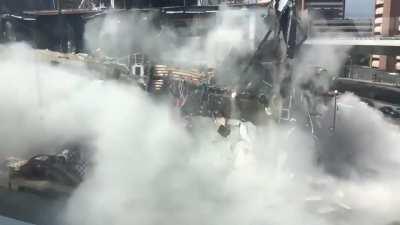 A 3 story mall that was still under construction started making some noises from the metal structures.. everyone was evacuated and 5 minutes later the collapse occurred.