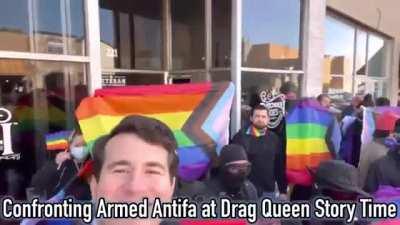Alex Stein trolling armed Antifa members outside Drag-Queen Story Time event.