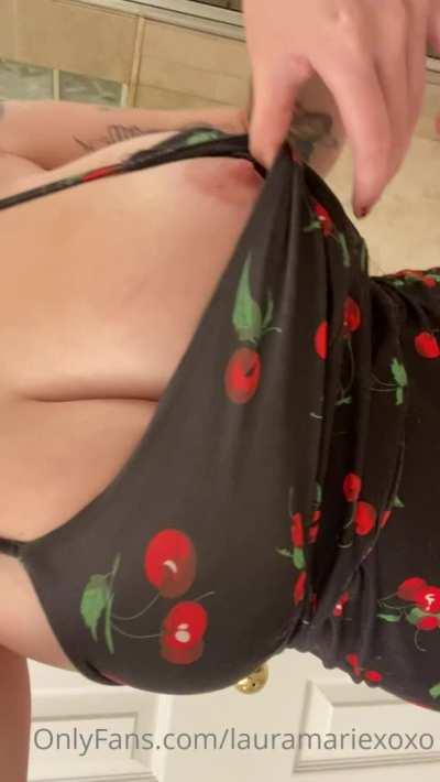 Playing with her nipples