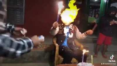 Play with fire while spraying flamable foam on his face nice birthday