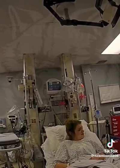 A woman arrives at the hospital