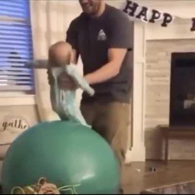 Putting a baby on a balloon