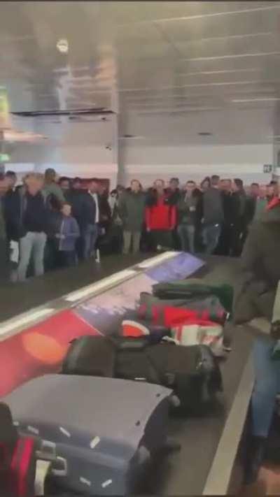 Meanwhile, at the airport...