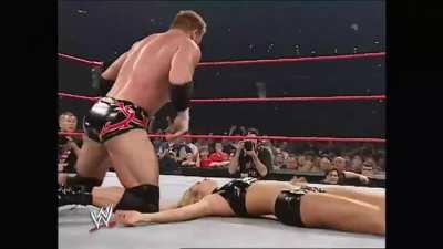 Test destroys Stacy Keibler with a Pumphandle Slam