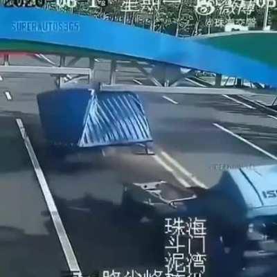 Truck hits bridge.