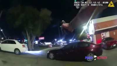 Officer abruptly opens car door and fires at innocent teen eating a burger in his car outside of McDonald's.