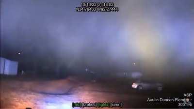 Police in Arkansas chase a suspect who, it turns out, had a can of gasoline in his backpack. When an officer uses a taser on him, bad things result.