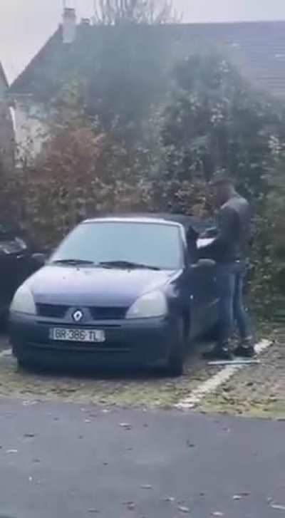 Lighting lady's car on fire for no reason