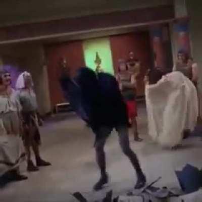 Adam West as DC comics Batman performs the memorable Batusi in 1966