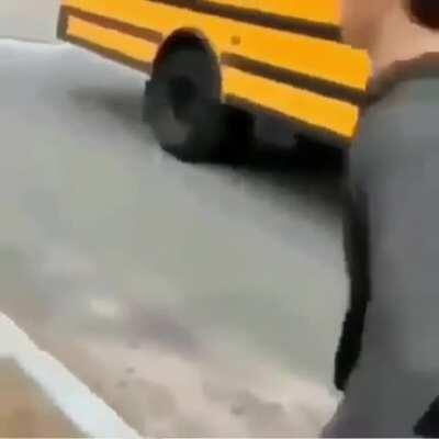 Guy jumps into a sign