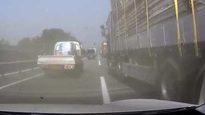 Idiot in truck appears to be sleeping behind the wheel on the highway