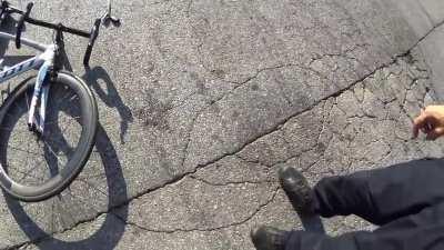 Cop was texting while driving and hits cyclist head on