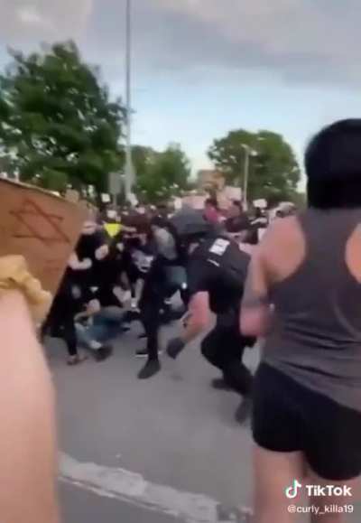 Man speaks to protesters before police try to cuff him they then proceed to pepper spray the crowd