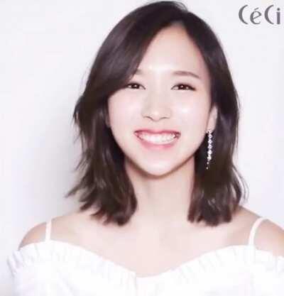Mina smiling