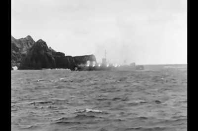 LSM(R)-188-class rocket artillery support ships unleash barrages of 5 inch rockets in support of the amphibious invasion of Okinawa in late March 1945