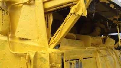 Guy crashes into a paint truck. Gets covered in paint.