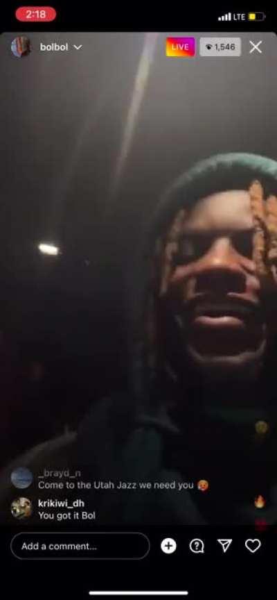 Bol Bol listening to lone with Ian Connor