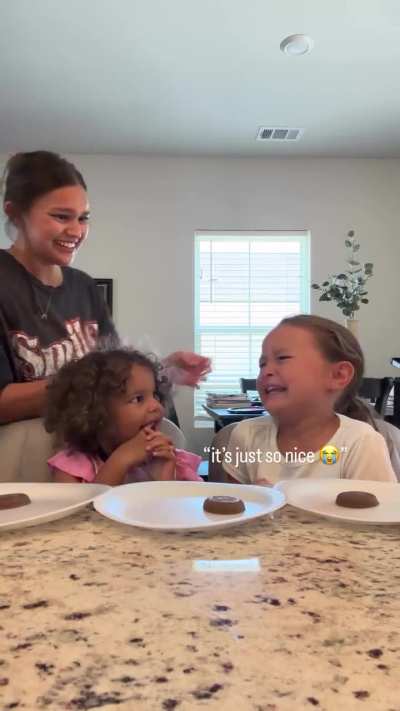 So heartwarming to see these little girls sharing with mum