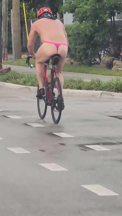 Fort Lauderdale Florida man casually biking in a thong. 