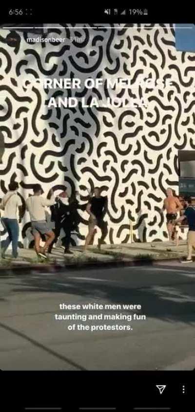 Madison Beers IG story. The guys where taunting the protesters and tried to kick one. Got what he deserved.